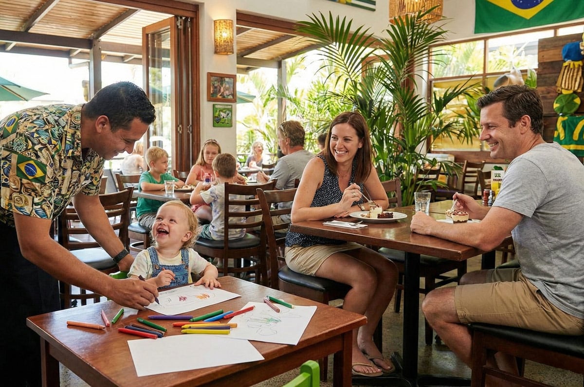 Camarero brasileño interactuando con un niño en un restaurante familiar, mostrando la hospitalidad y calidez de Brasil.
